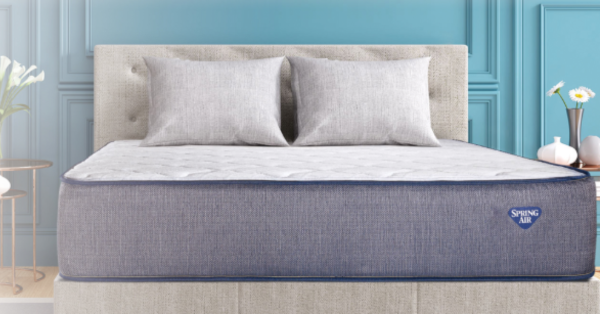 Spring Air mattress displayed in a bright bedroom setting at Meyers Furniture