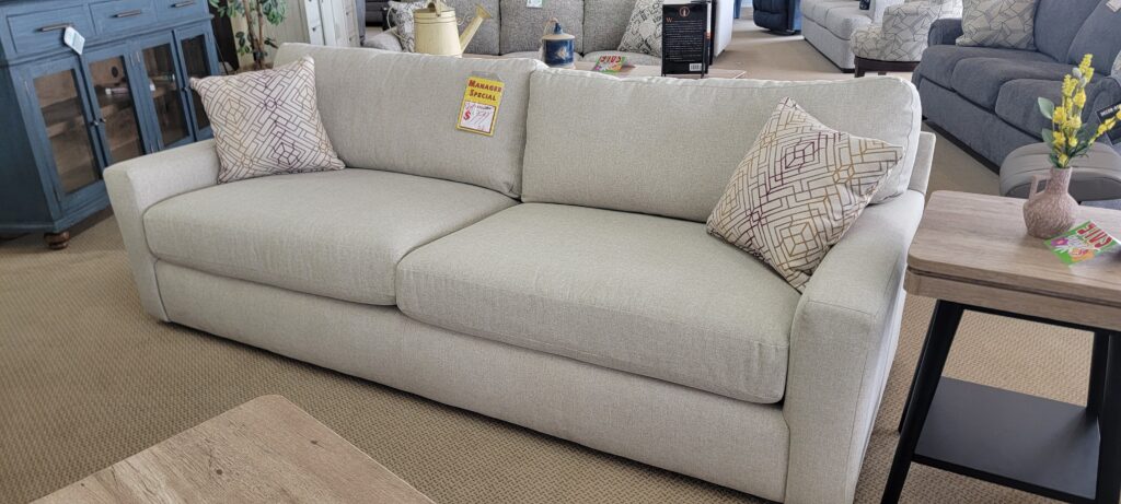 Wide-arm silhouette with a single bench-style seat cushion and clean, modern lines. A statement of easygoing style.