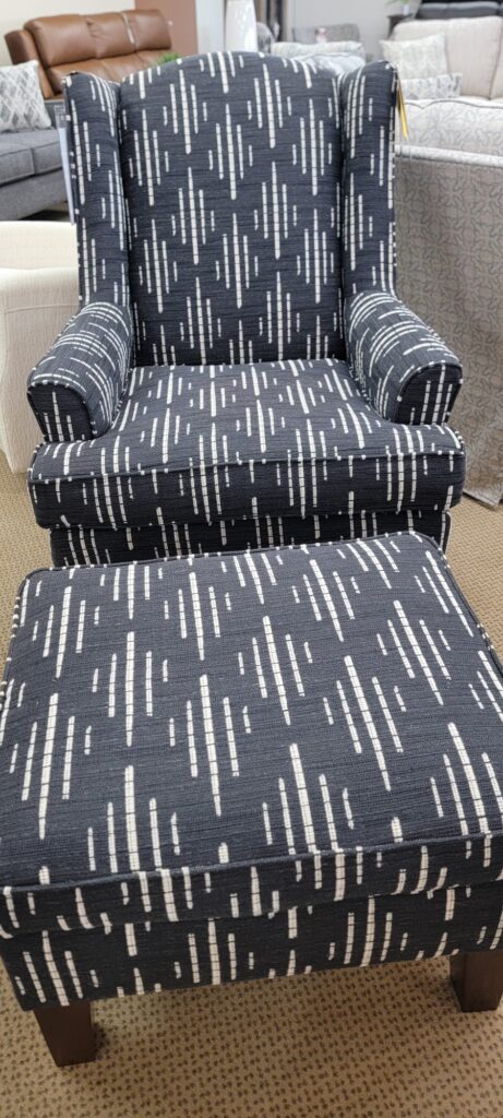 Patterned accent chair with matching ottoman on the showroom floor at Meyers Furniture in Rochelle IL