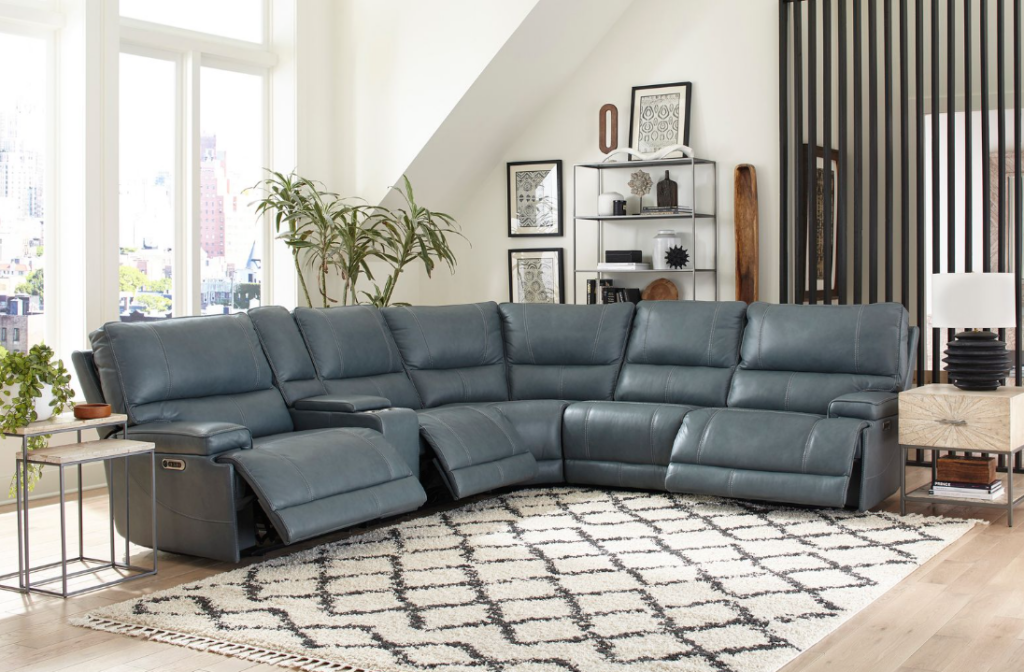 Blue gray Parker House 6-piece reclining sectional shown in a bright living room with reclining seats extended.