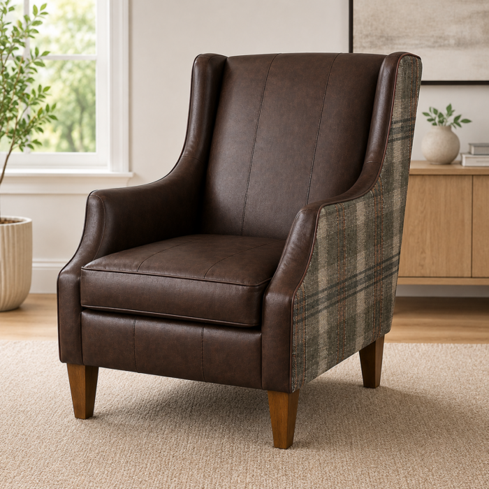 Brown leather wingback accent chair with tapered wood legs in a warm modern living room setting