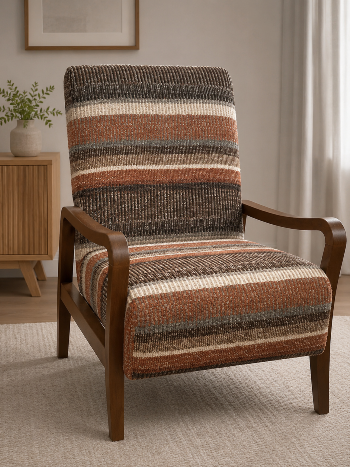 Striped upholstered accent chair with warm wood frame in a modern neutral living room setting