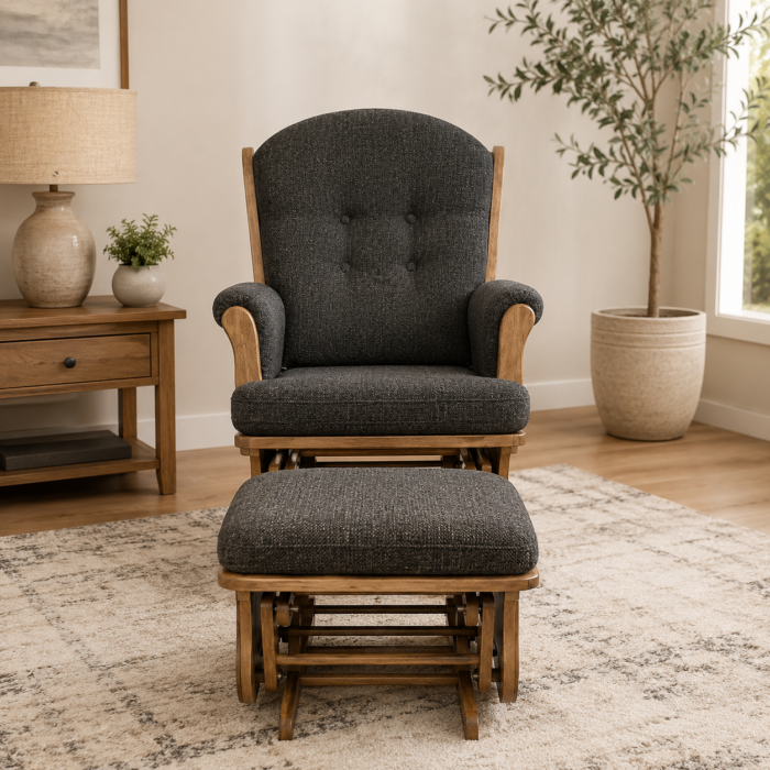 Amish-made dark upholstered swivel glider chair with matching ottoman in a warm modern living room setting