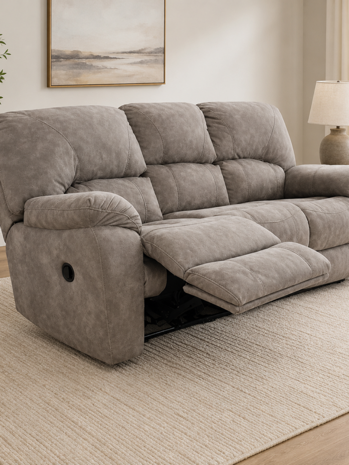Homestretch reclining sofa in Canyon Fog RELIAPEL performance fabric with manual reclining seat and plush cushioning.