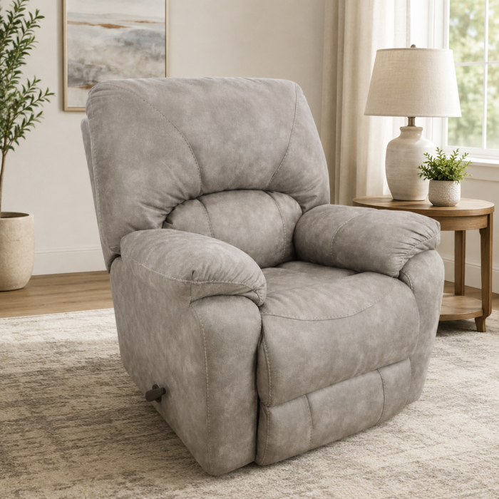 HomeStretch Sapphire manual recliner upholstered in Canyon Fog RELIAPEL fabric with plush pillow arms and padded back.