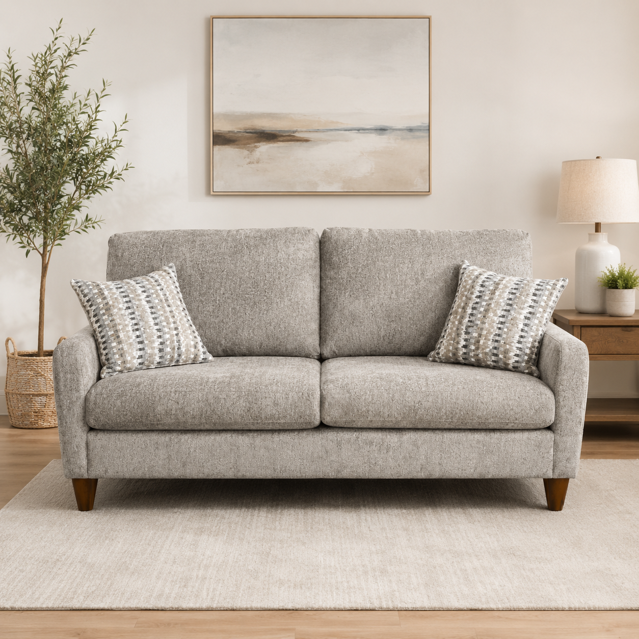 Bestcraft stationary sofa upholstered in Jano Brindle fabric with attached back cushions and decorative accent pillows.
