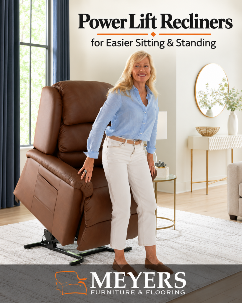 Woman standing beside a brown power lift recliner