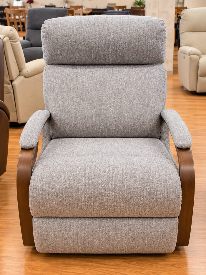 Best Home Furnishings silver gray recliner with open brown curved arms and a broad upper back cushion