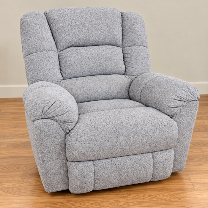 HomeStretch light gray plush recliner with tiered back cushions and generously rounded arms