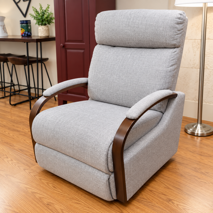 Best Home Furnishings light gray recliner with dark brown curved arms and padded arm tops