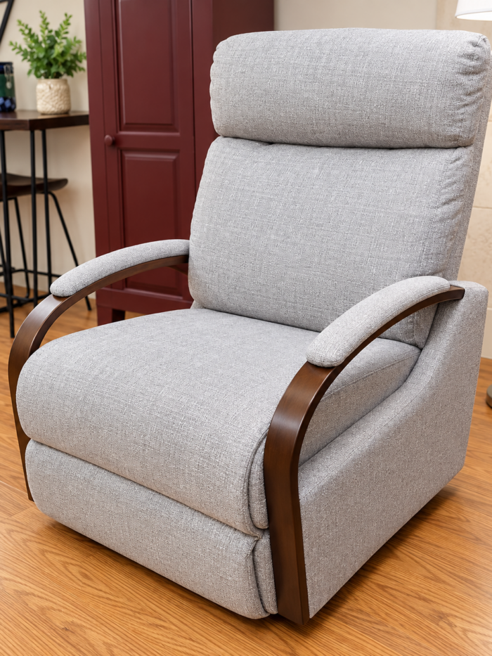 Best Home Furnishings light gray recliner with dark brown curved arms and padded arm tops
