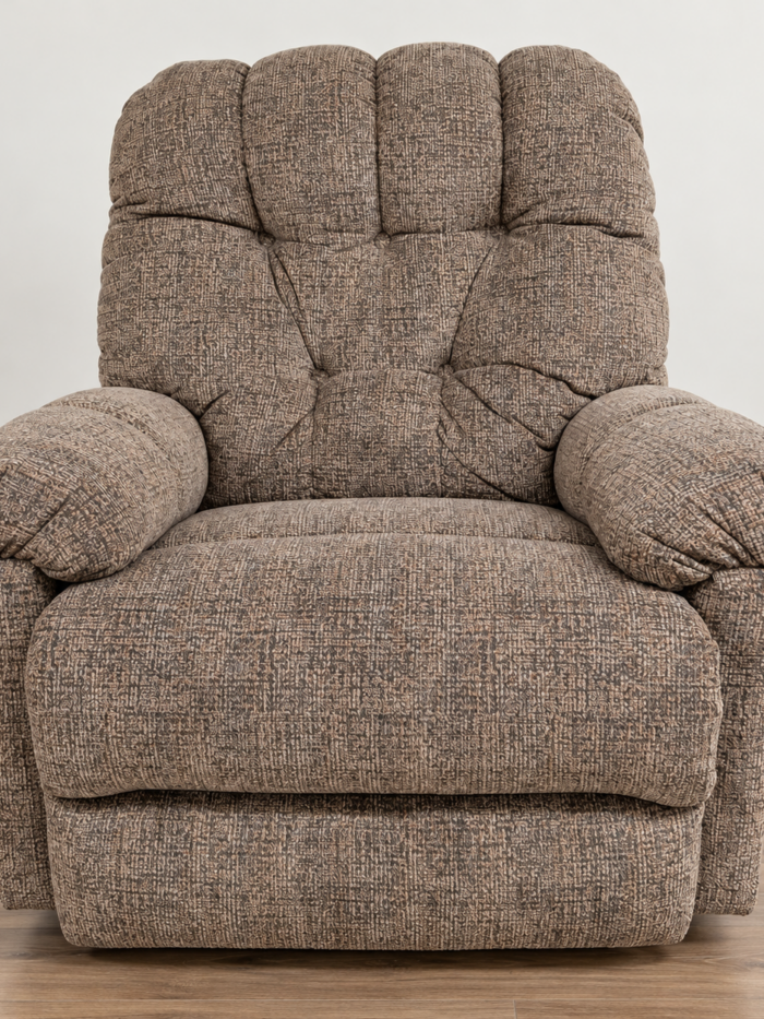 Best Home Furnishings mocha recliner with textured upholstery, tufted back and pillow arms