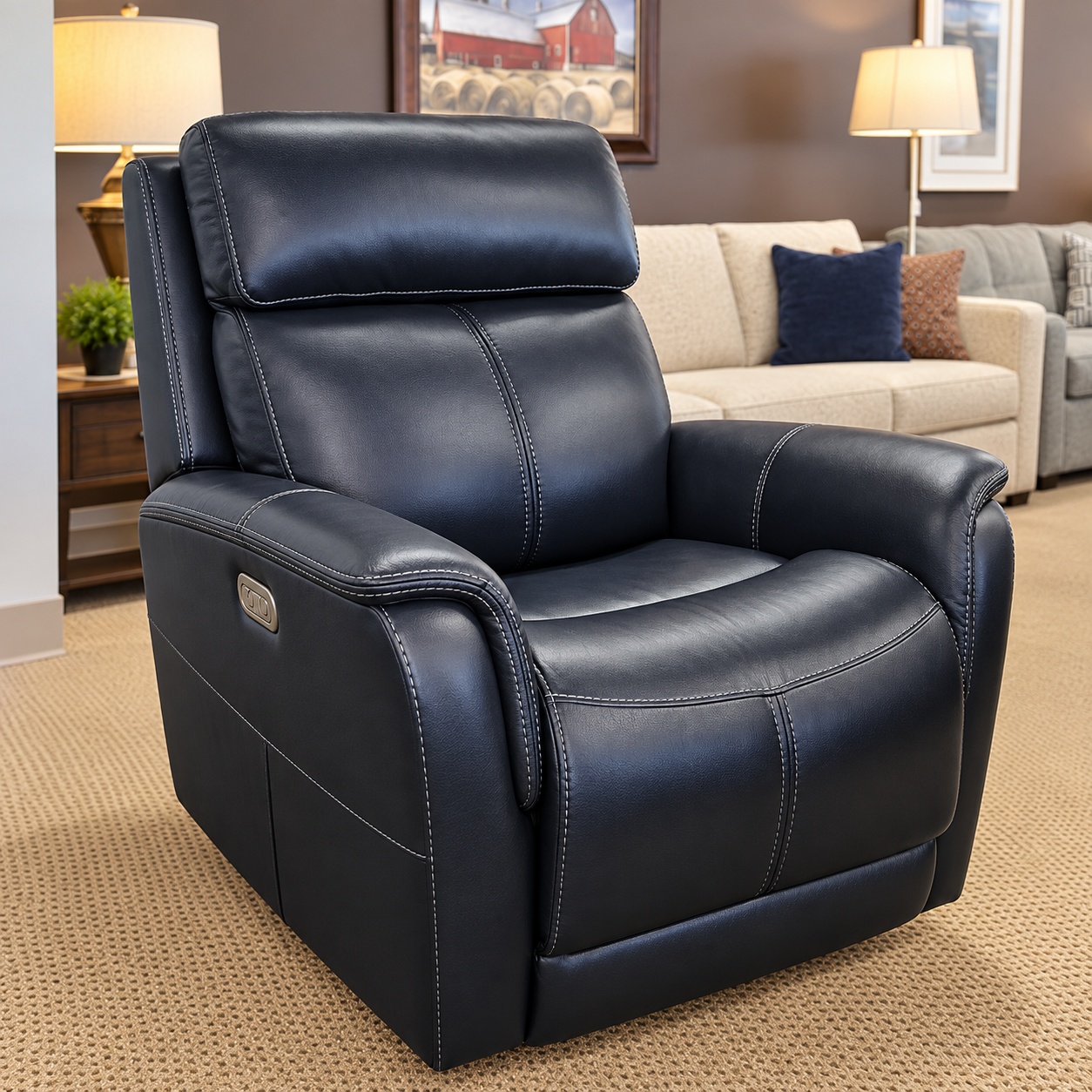 Flexsteel black power recliner with light contrast stitching, padded arms, and side controls