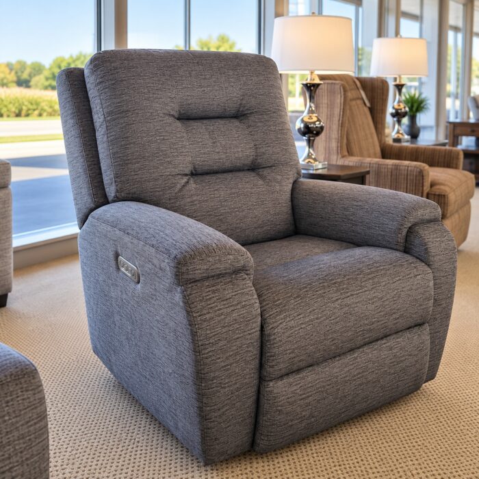 Flexsteel gray fabric power recliner with a segmented back, padded arms, and side controls