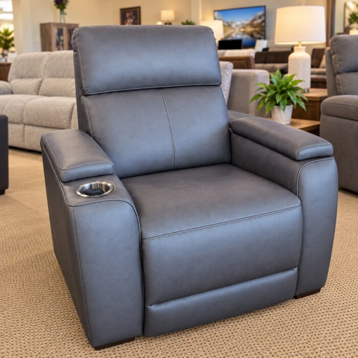 Flexsteel gray recliner with a cupholder, padded arm tops, and contrasting stitching